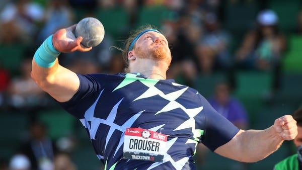Ryan Crouser lets loose a world record throw 76 fe