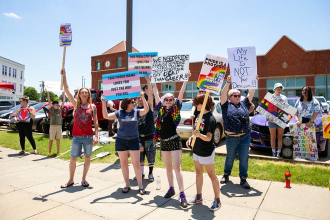Participants at the Rally for Equality gather along Garrison Avenue in Fort Smith on June 20, 2021.