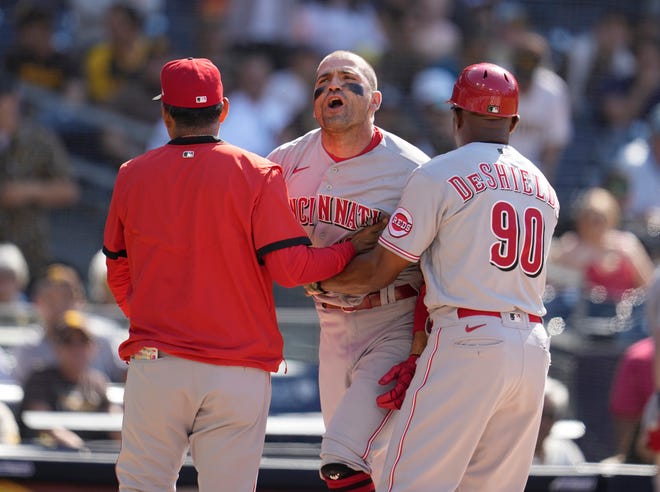 Jun 19, 2021; San Diego, California, USA; Cincinnati Reds first baseman Joey Votto (19) argues a called third strike during the first inning against the Cincinnati Reds at Petco Park.