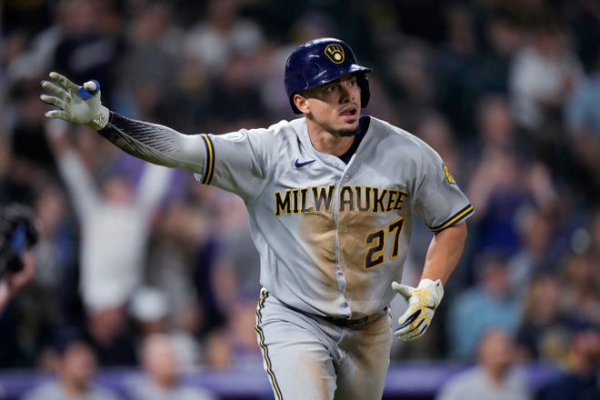 Willy Adames watches his two-run homer off Rockies reliever Tyler Kinley in the ninth inning Saturday in Denver.