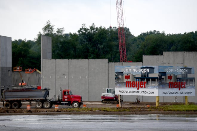 Walls are going up as construction continues on the Meijer Supercenter at the Greens at Belden development along Fulton Road NW in Jackson Township.