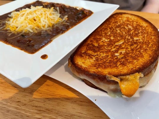 The Flower Pot menu includes the 3 Cheese Griller and bowl of brisket chili.