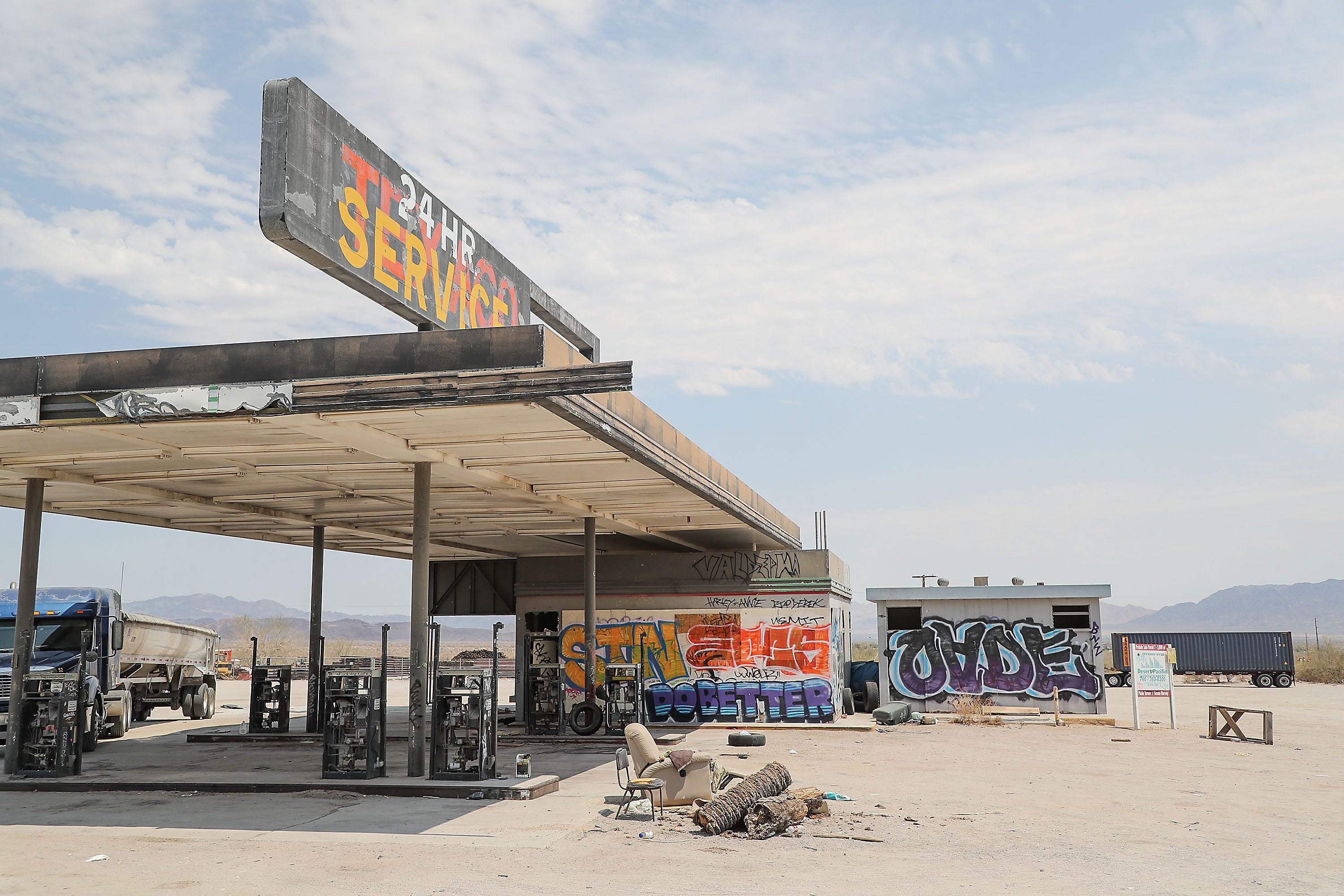 A gas station in Desert Center is stripped of much of its wiring.