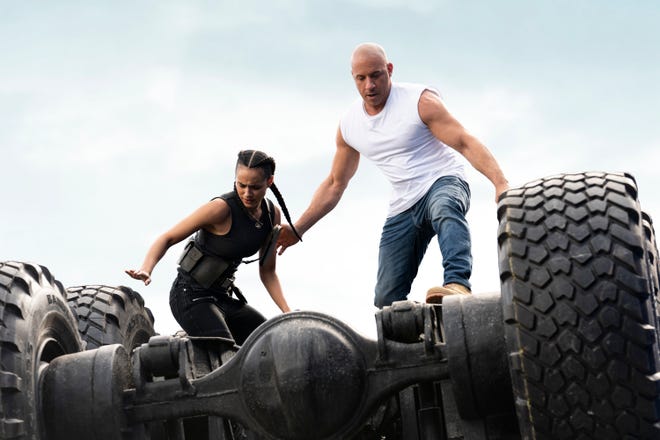 Ramsey (Nathalie Emmanuel) and Dom (Vin Diesel) return for another mission to save the world in "F9," the ninth installment in the "Fast and Furious" movie series.