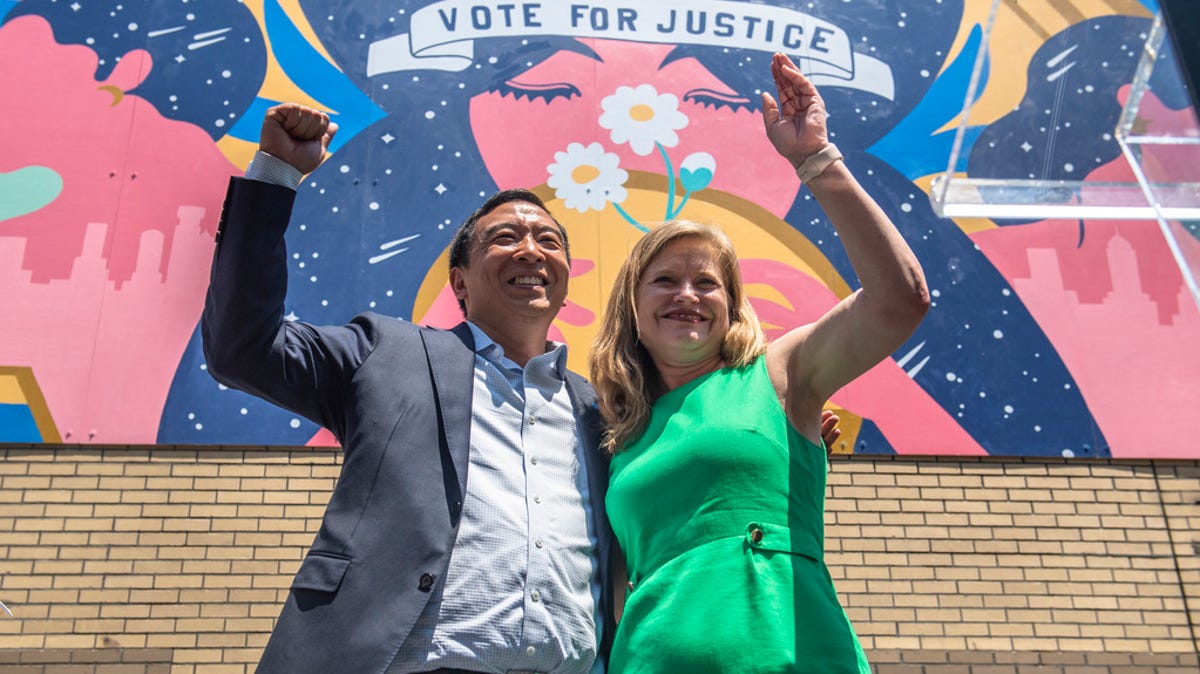 Mayoral candidates Andrew Yang and Kathryn Garcia wave to New Yorkers after speaking at the AAPI Democracy Project's "Voting is Justice Rally" in Chinatown on Sunday, June 20, 2021, in New York.