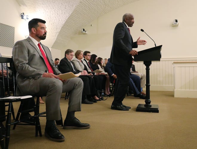 Ohio State head football coach Ryan Day, left, listens as Ohio State athletic director Gene Smith, right, testifies on name, image and likeness bill, at the Ohio Statehouse on Tuesday, June 22, 2021.