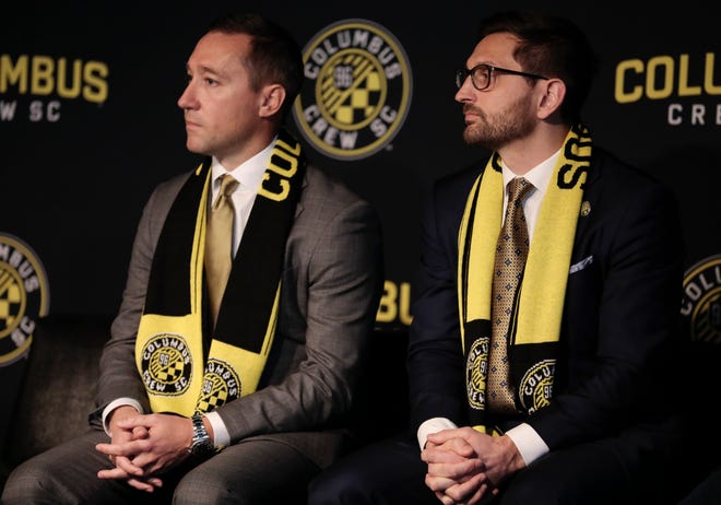 Crew coach Caleb Porter (left) and general manager Tim Bezbatchenko are confident the team will rebound from a disappointing season.