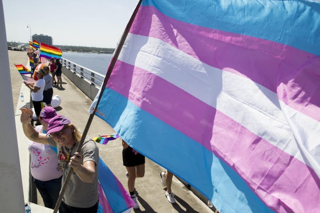 Marchers gather to 'Gay the Hathaway" during a Pride Month celebration on June 23, 2019. The event returns on Sunday.