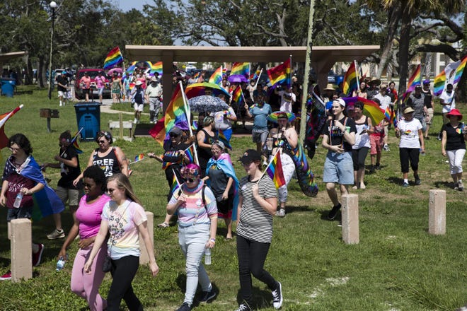 Crowds formed at Carl Gray Park before walking to the Hathaway Bridge for the 'Gay the Hathaway' event in 2019.
