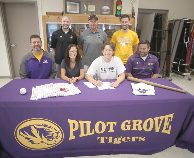 Pilot Grove’s Bailey Quint signed a baseball letter of intent with North Central Missouri College in Trenton on Wednesday in the high school commons. Quint, a four-year starter for the Tigers, finished the season hitting .616 with 45 hits in 73 at bats. On hand during the signing were Pilot Grove baseball coach Joe Vossler, Bev Crawford, Bailey Quint and Pilot Grove Athletic Director Derek Skaggs. (back row, left to right) NCMC assistant coach Ryan Suttenfield, NCMC head coach Donnie Hillerman and Pilot Grove assistant coach Grant Fricke,