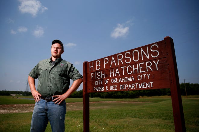 John Rayfield was hired as Oklahoma City's fisheries biologist last year. His previous jobs included shark research in the Bahamas, traveling with and monitoring commercial fishing boats and working in Alaskan salmon hatcheries.