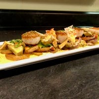 Pan-seared fresh scallops are on the menu at 2 Chez Restaurant, 7815 N. Knoxville Ave., Peoria.
