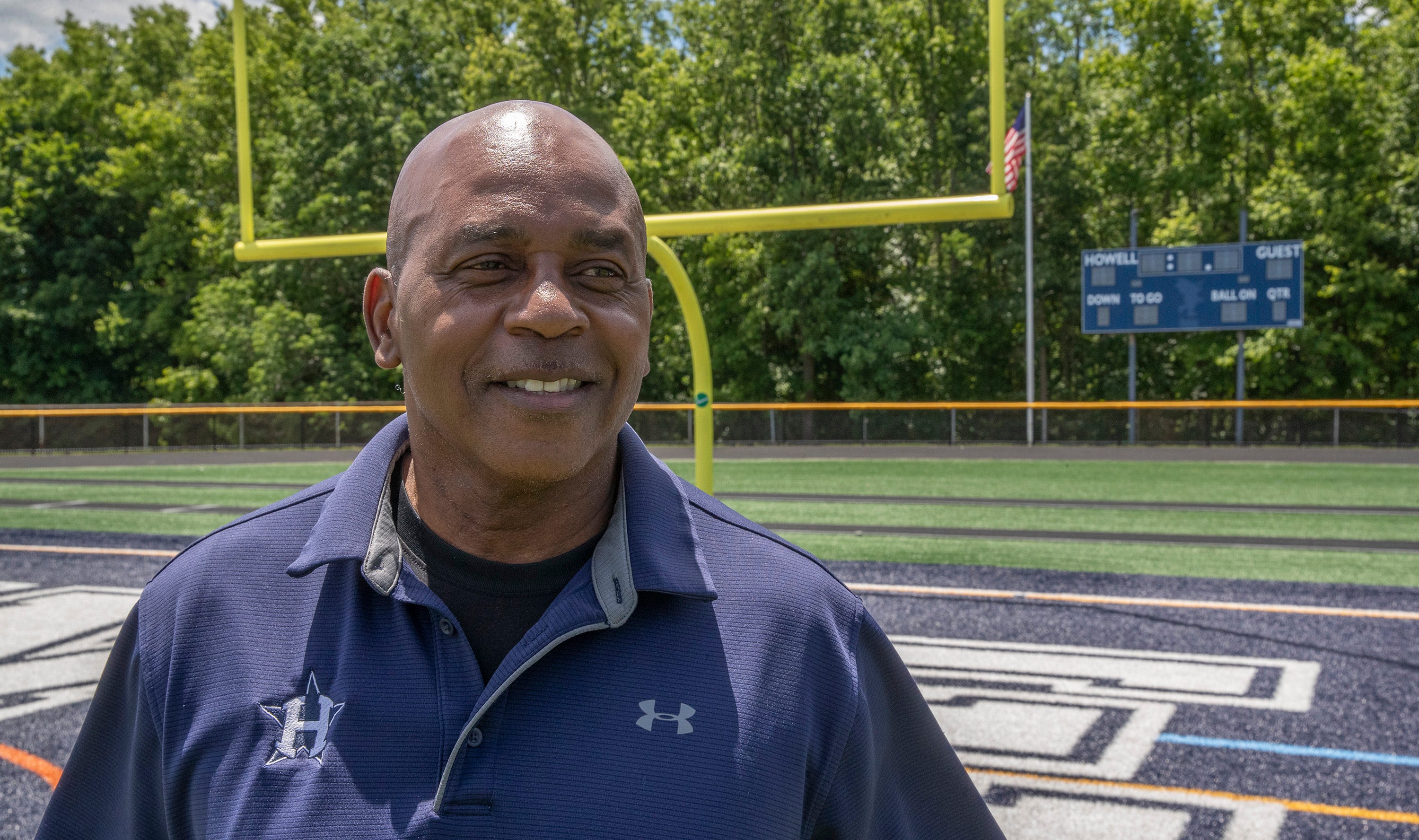 Howell NJ football coach Bill Hill, legendary player, is back home