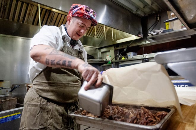 Steve Goff prepares chicken feet at Jargon in West Asheville June 24, 2021.