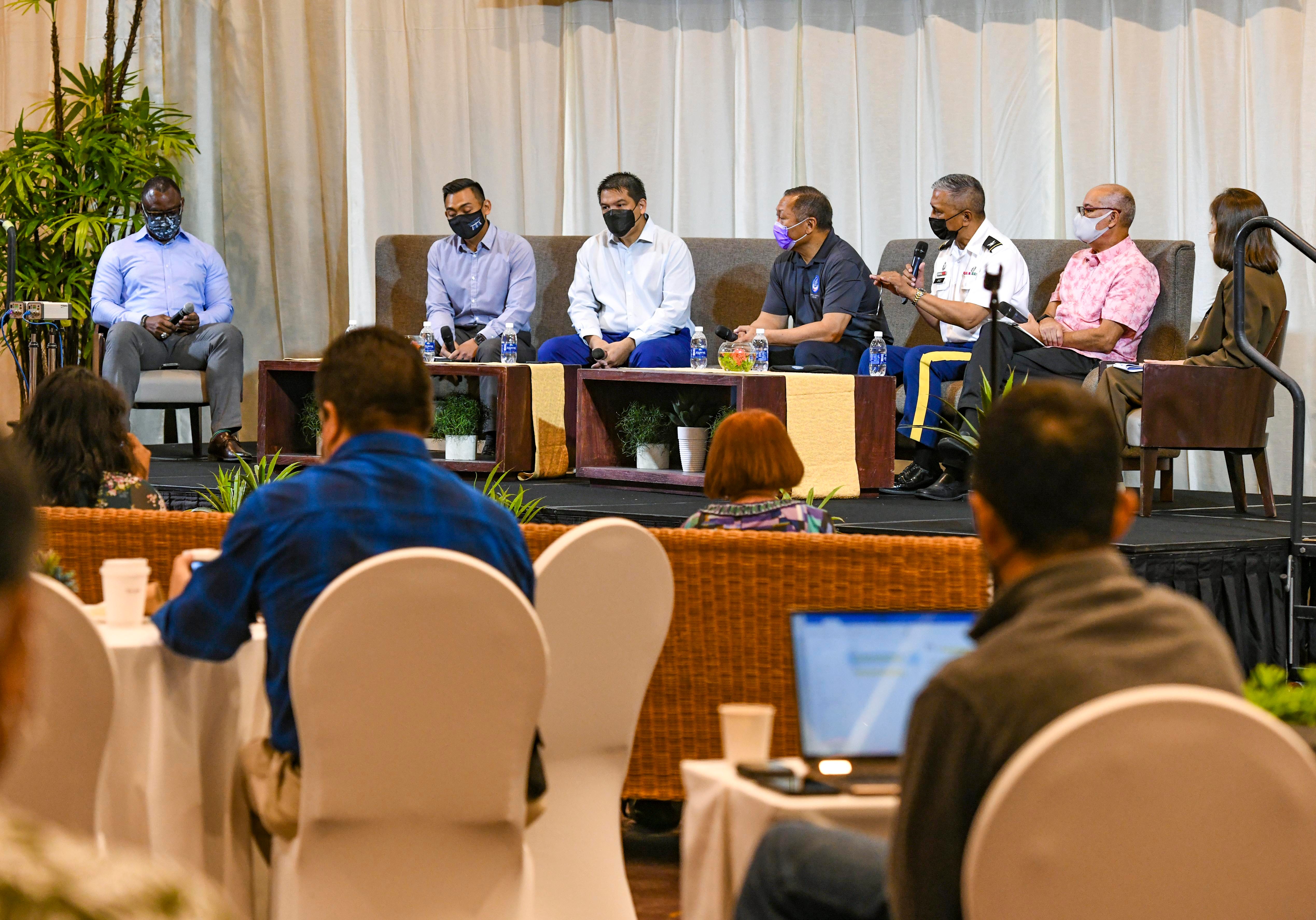 The first round of panelists gather on stage to discuss the possibility of reopening of the island to tourism during the Guam Hotel & Restaurant Association's Economic Forum conducted at the Hyatt Regency Guam in Tumon on Thursday, June 24, 2021.