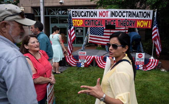 Protestors rally against critical race theory in schools in Virginia on June 12, 2021.