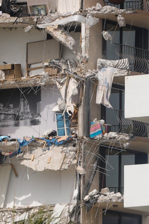 A view of the 12-story building, which partially collapsed Thursday morning, as seen from the beach in Surfside, Florida.