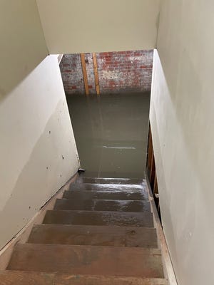 The basement of Red Bag Boutique was submerged in water.