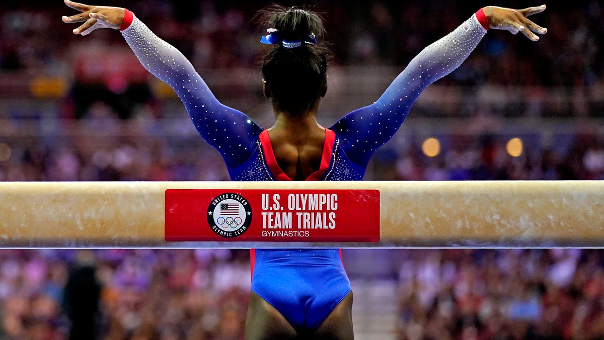 Simone Biles competes on the beam during the U.S. Olympic Team Trials - Gymnastics competition at The Dome at America's Center. Grace Hollars-USA TODAY Sports