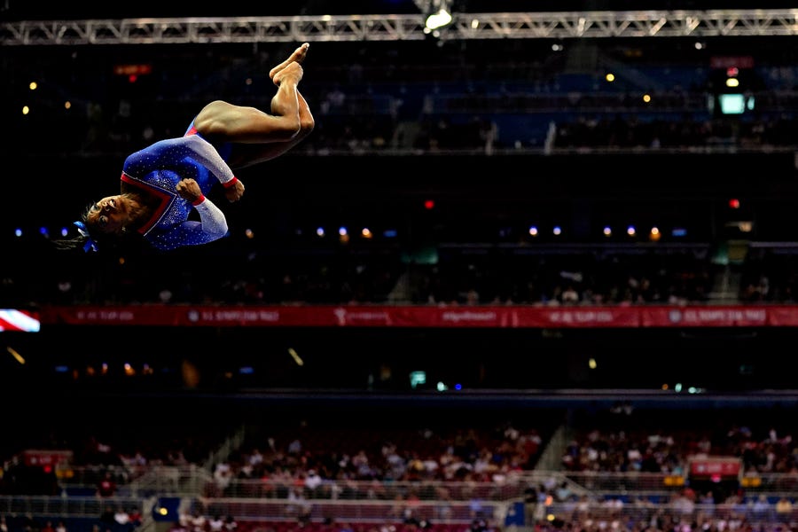 Simone Biles competes on the beam during the U.S. Olympic Team Trials - Gymnastics competition at The Dome at America's Center. Grace Hollars-USA TODAY Sports