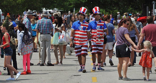 Neil Mayur and his twin, Jay Mayur, attend the 2019 Twins Day Festival