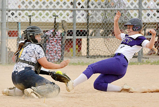 Watertown Impact base runner Jade Lund is tagged out at home by Brandon Valley Outlaws catcher Gracelynn Kranzler during a 16-and-under division game over the weekend in the Watertown Fastpitch Softball Association's Premier Throwdown tournament. The tourney concluded Sunday at Koch Complex and Foundation Fields.