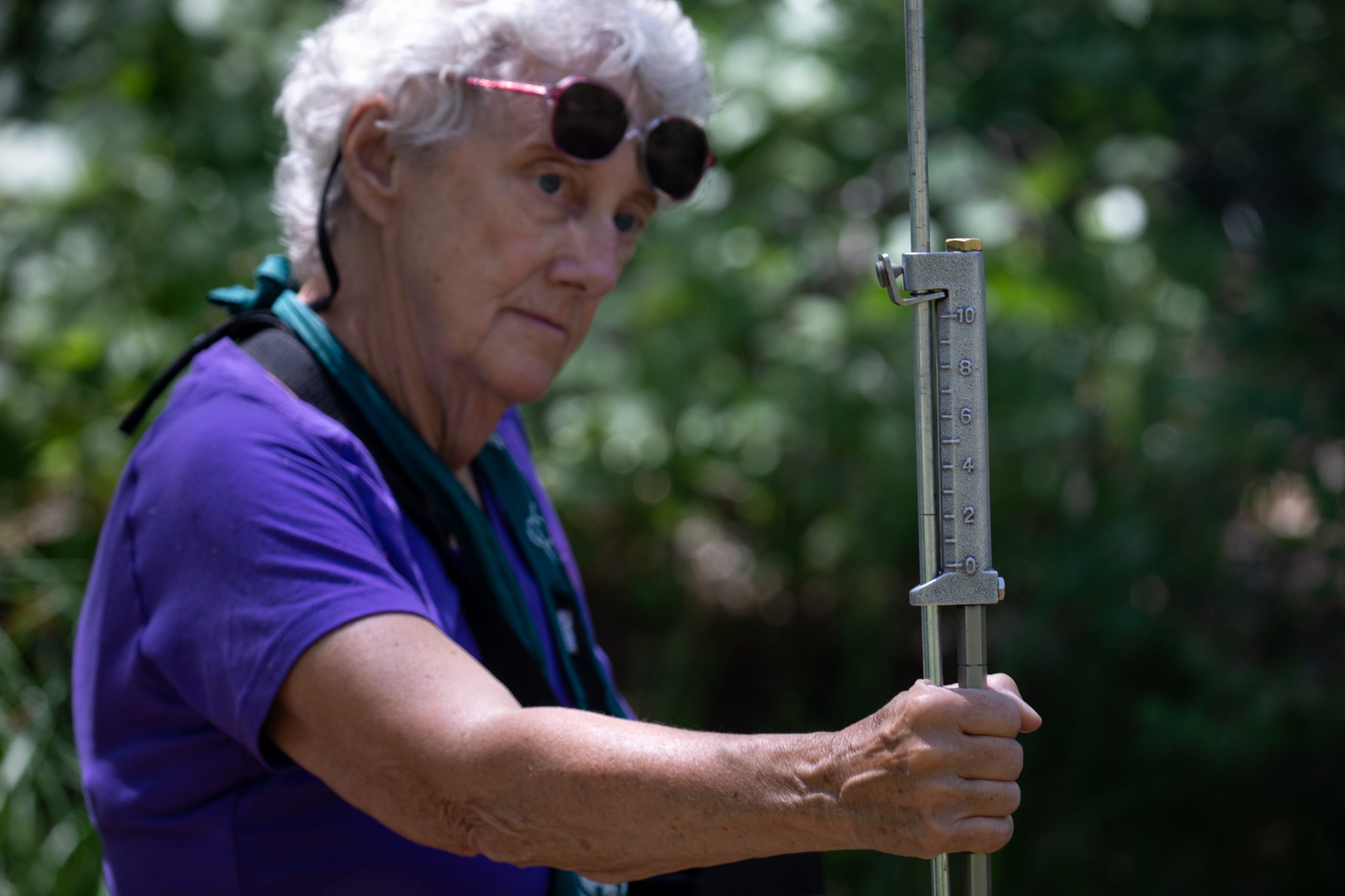 Jenny Cobb takes flow measurements in the Verde River near Perkinsville on June 25, 2021.