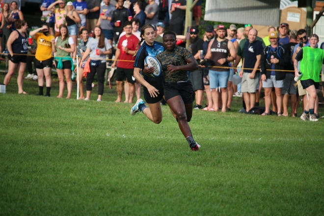 U.S. Marine Corps Lance Cpl. Ubaida Ahmed of Marine Corps Air Station Cherry Point carries the ball during the 2021 Armed Forces Rugby Championship held in Wilmington, June 25-26.