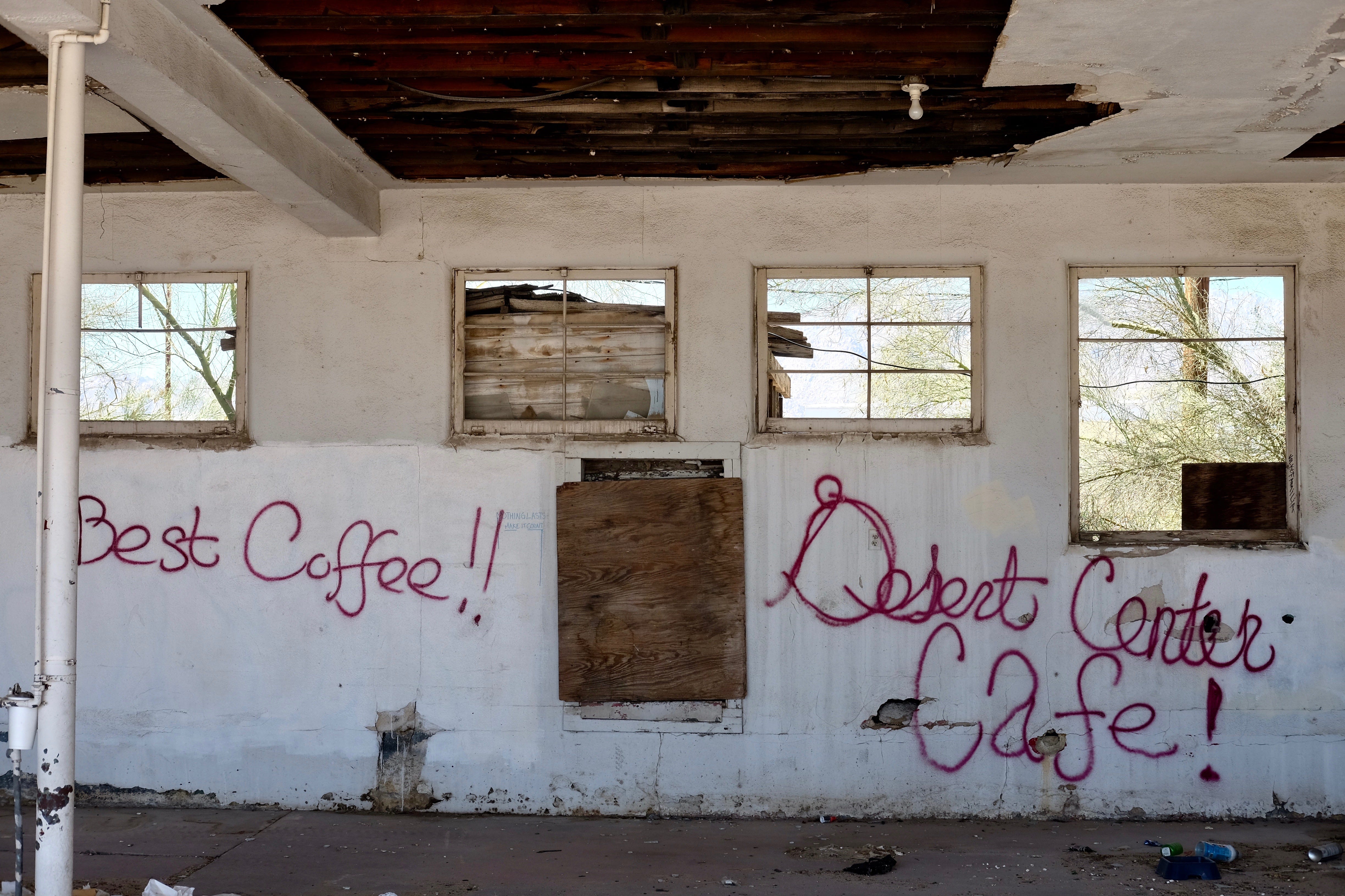 Graffiti marks the decaying buildings along the town's main street.