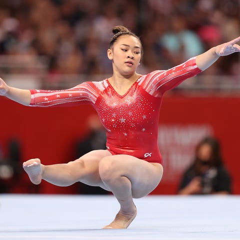 Suni Lee competes in the floor exercise during the