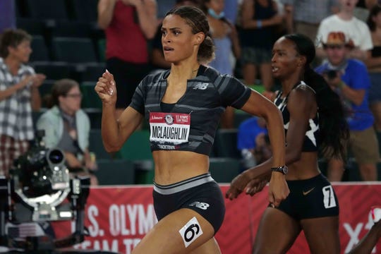 Sydney McLaughlin defeated Dalilah Muhammad in the women's 400m hurdles, breaking a world record of 51.90 seconds.