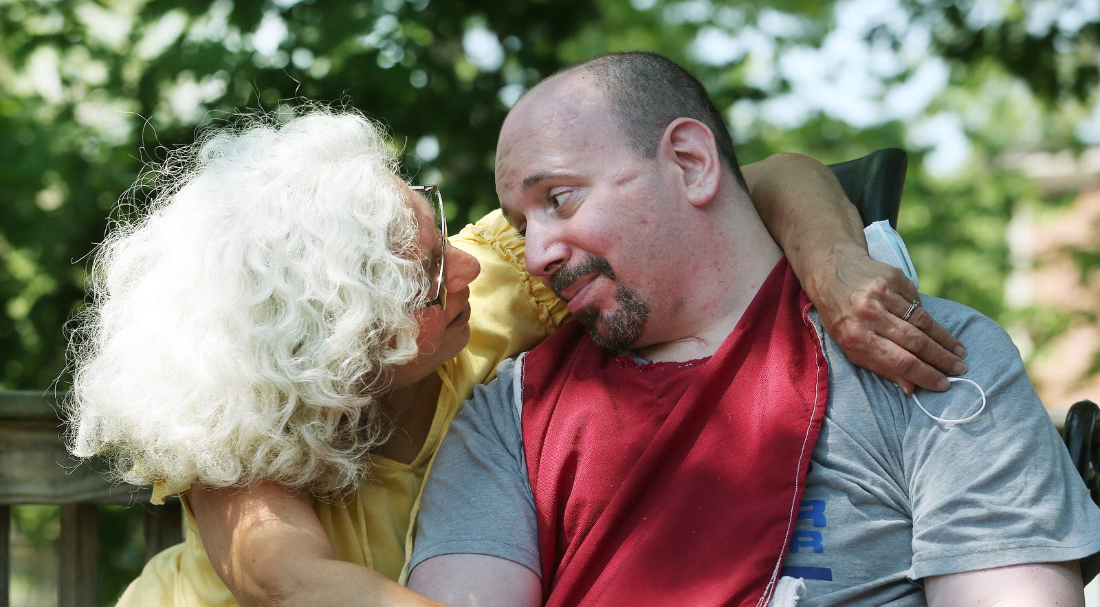 Pam Costello visits her son Jason Gagnon, 47, who suffered a traumatic brain injury in a 1996 car accident and has lived at the Zambarano Unit of Eleanor Slater Hospital for 10 years. "I see him happy. I see him content," she said. "They treat him like a human being here."