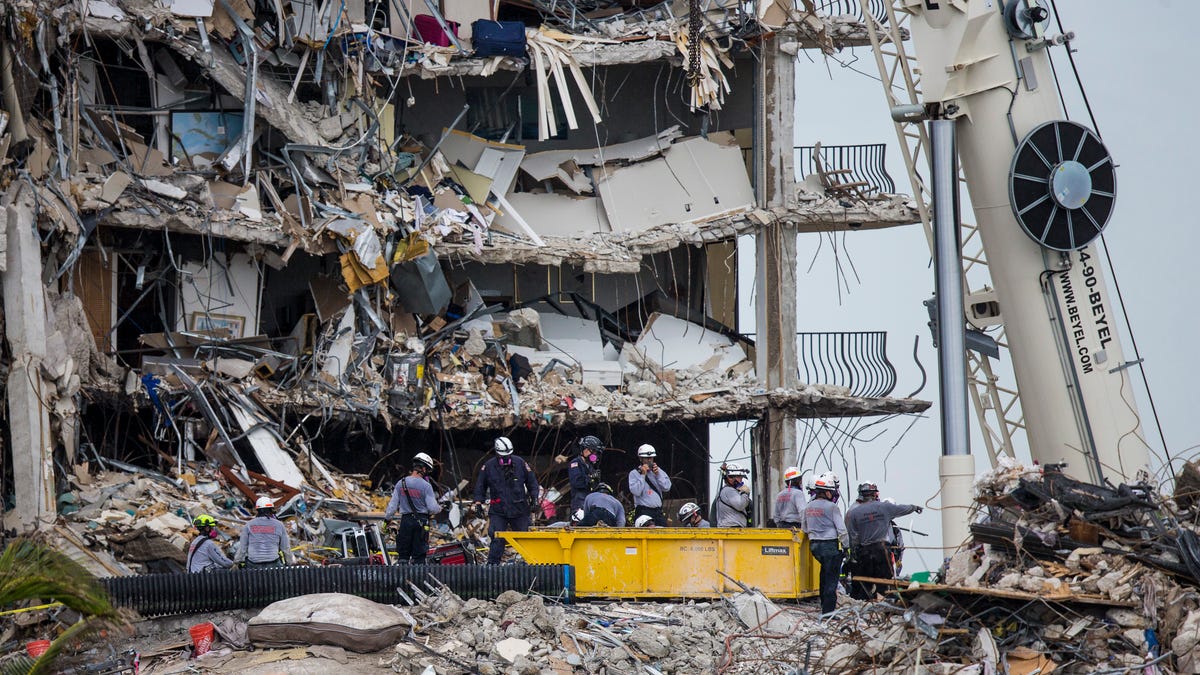 Rescuers continue to search through the rubble  of the Champlain Towers south condo collapse in Surfside, Fla. on Tuesday, June 29, 2021.