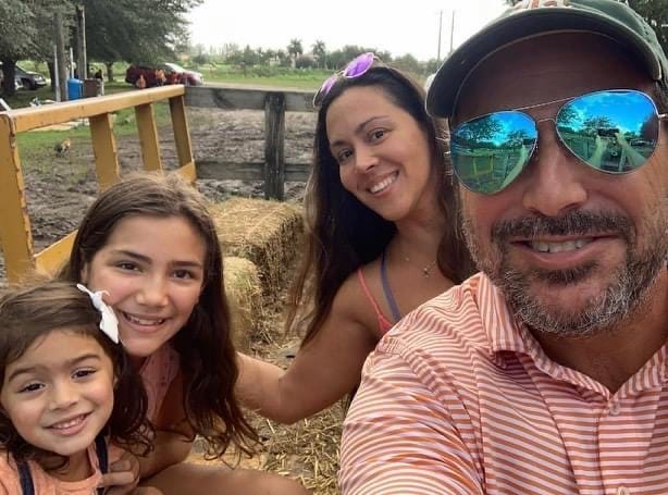 Marcus Joseph Guara, pictured here with daughters Emma Guara, left, and Lucia Guara and his wife Anaely Rodriguez, died in the Surfside condo collapse. Marcus was 52.