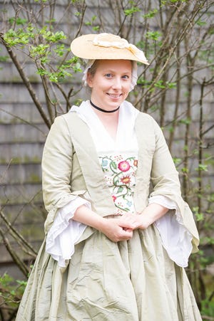 Newport Historical Society’s Elizabeth Sulock dressed as a member of the leisure class for a recent event at Newport’s Wanton-Lyman-Hazard House.