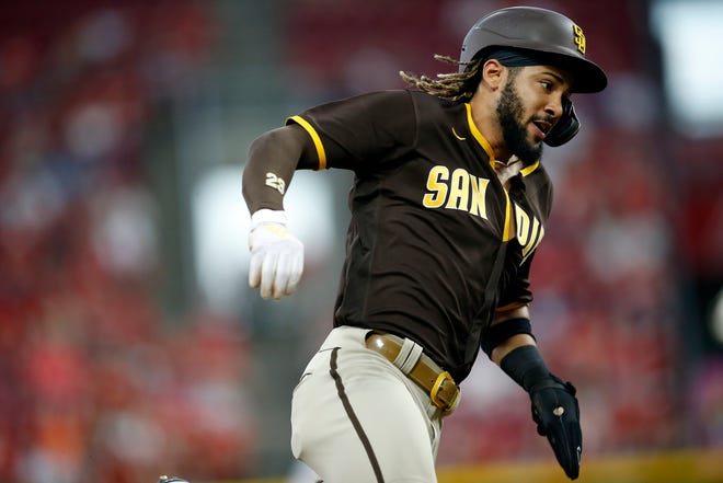 San Diego Padres shortstop Fernando Tatis Jr. (23) comes around to score in the first inning of the MLB National League game between the Cincinnati Reds and the San Diego Padres at Great American Ball Park in downtown Cincinnati on Tuesday, June 29, 2021. The Padres led 5-2 in the fifth inning.