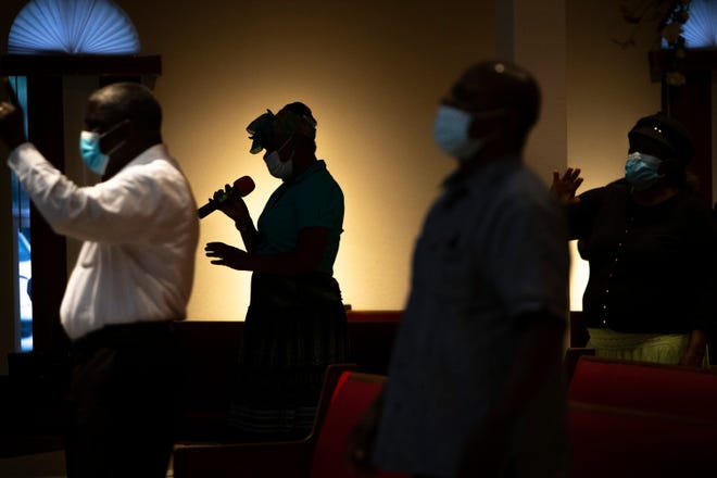Parishioners worship at The Independent Haitian Church of God in East Naples on Tuesday, June 29, 2021.