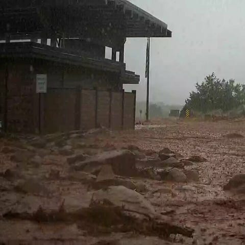 A flash flood hits Zion National Park on Tuesday, 