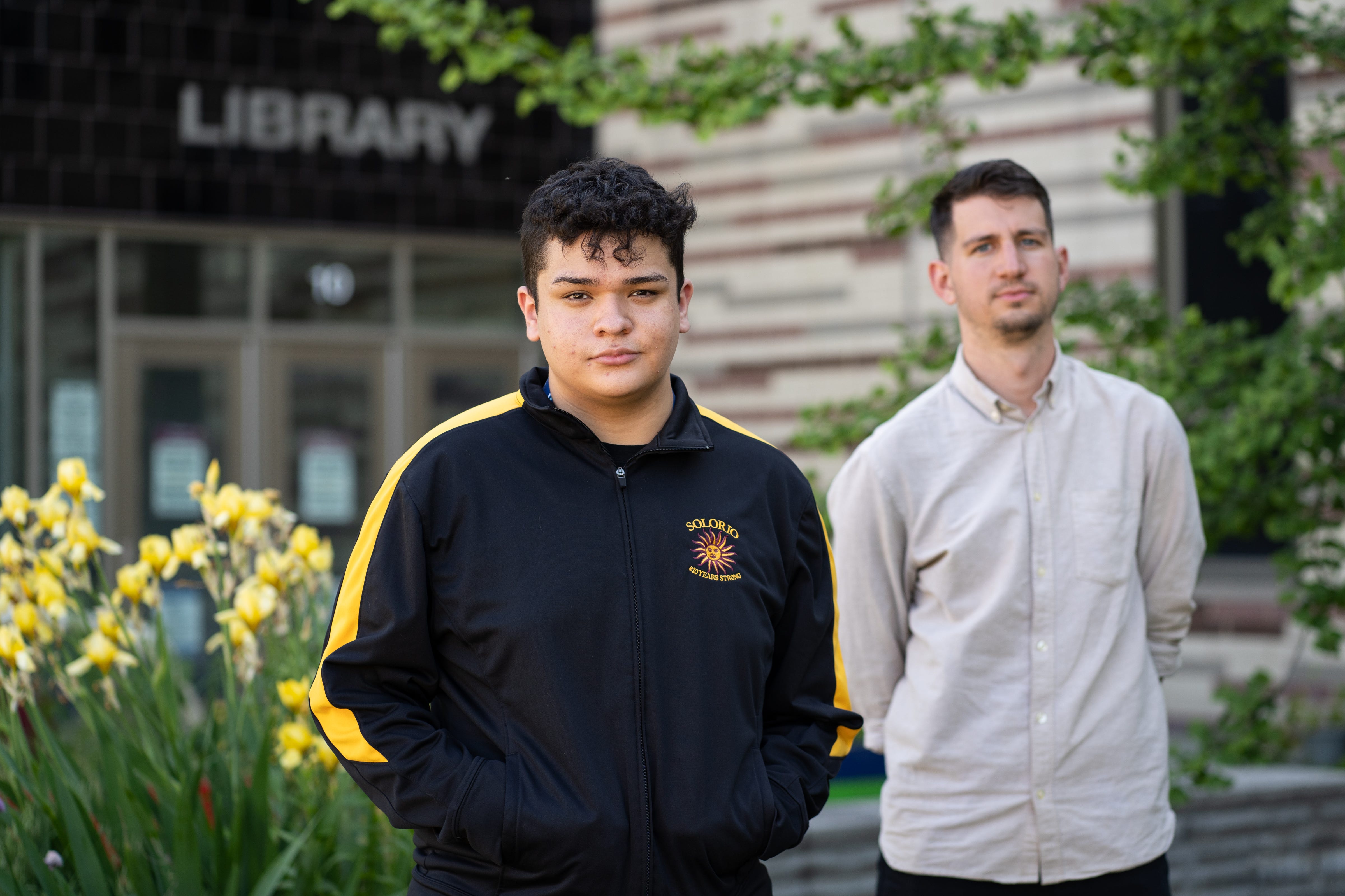 Leonel Gonzalez and his senior seminar teacher and OneGoal adviser Christopher Vienna outside of Solorio Academy High School. OneGoal mentors like Vienna have worked through the pandemic to prepare students like Leonel for the next step after high school.