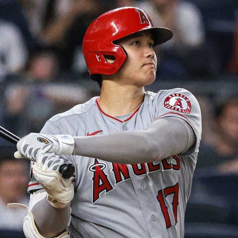 Shohei Ohtani watches his second home run of the g