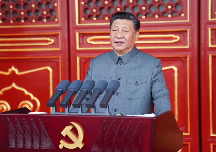 In this photo provided by China's Xinhua News Agency, Chinese President and party leader Xi Jinping delivers a speech at a ceremony marking the centenary of the ruling Communist Party in Beijing on July 1, 2021. China's Communist Party is marking the 100th anniversary of its founding with speeches and grand displays intended to showcase economic progress and social stability to justify its iron grip on political power that it shows no intention of relaxing.