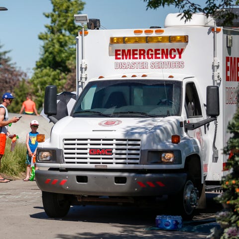 A Salvation Army EMS vehicle is setup as a cooling