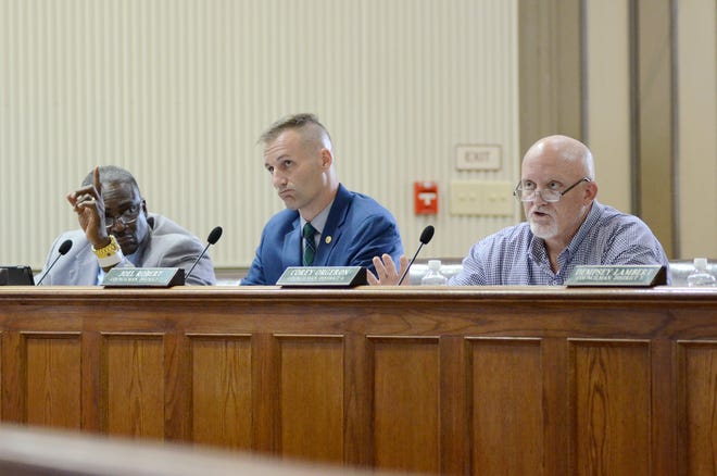 Ascension Parish Council members Alvin "Coach" Thomas, Joel Robert, and Corey Orgeron are shown during the July 1 meeting at the courthouse in Donaldsonville.