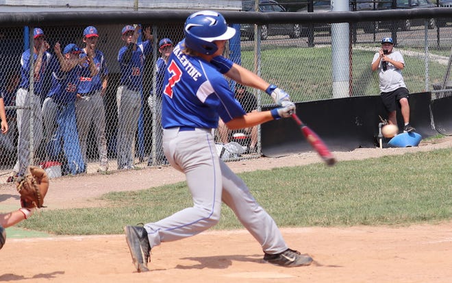 Jake Valentine hits a RBI single in Sunday's game for Cambridge Legion during the Don Coss tournament.