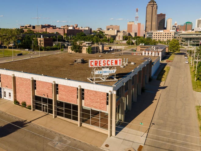 The former Crescent Chevrolet, 555 17th St., will be partially leased by Big Grove Brewery as part of the Krause+ development plans for the Western Gateway neighborhood.