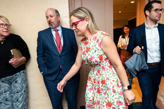 Sen. Kyrsten Sinema, D-Ariz., leaves a closed-door bipartisan infrastructure meeting with a group of senators and White House aides on Capitol Hill in Washington, Tuesday, June 22, 2021. (AP Photo/Manuel Balce Ceneta)