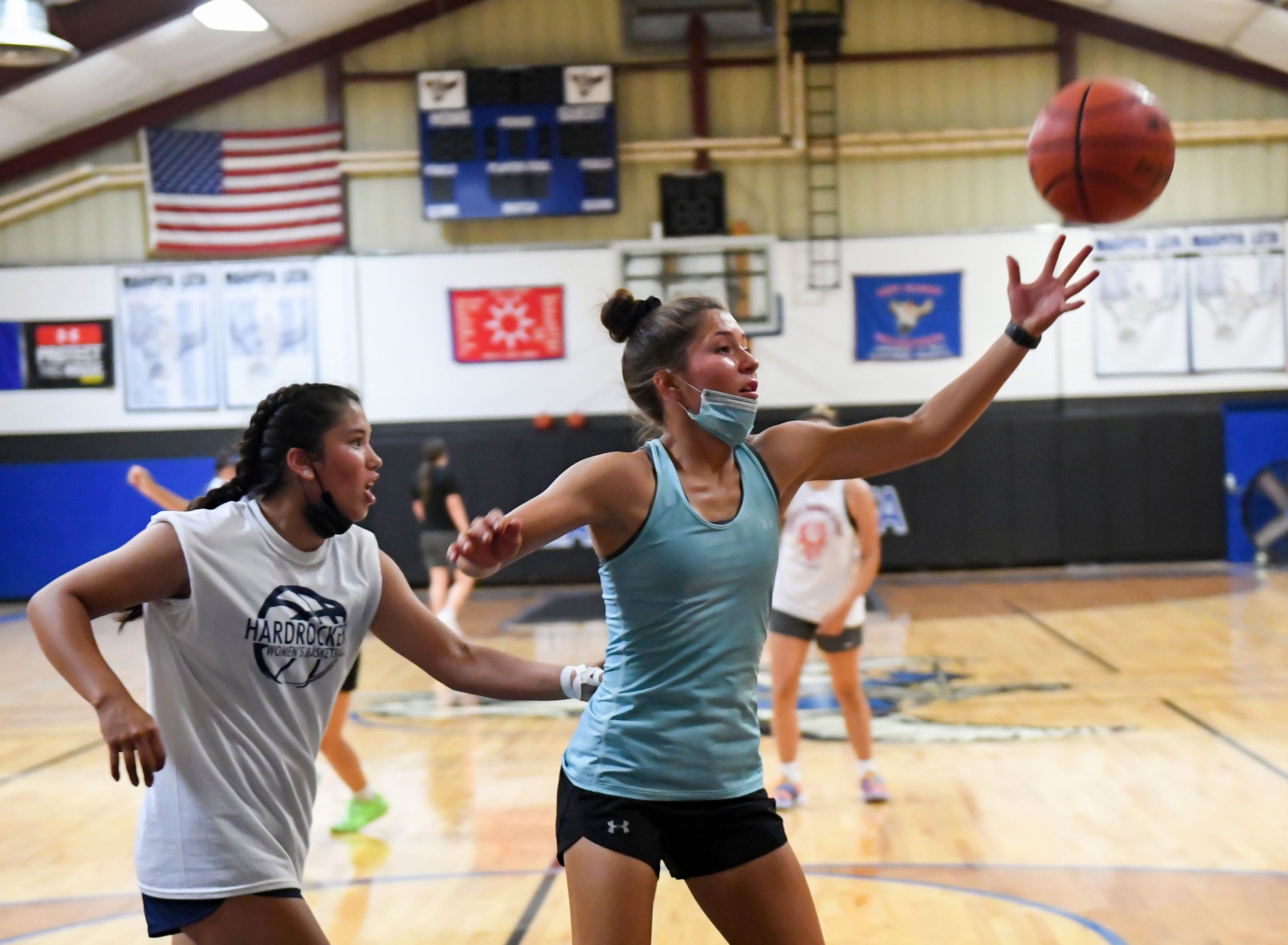 Red Cloud's Jade Ecoffey reaches for the basketball during practice on Tuesday, June 15, 2021, on the Pine Ridge Reservation.