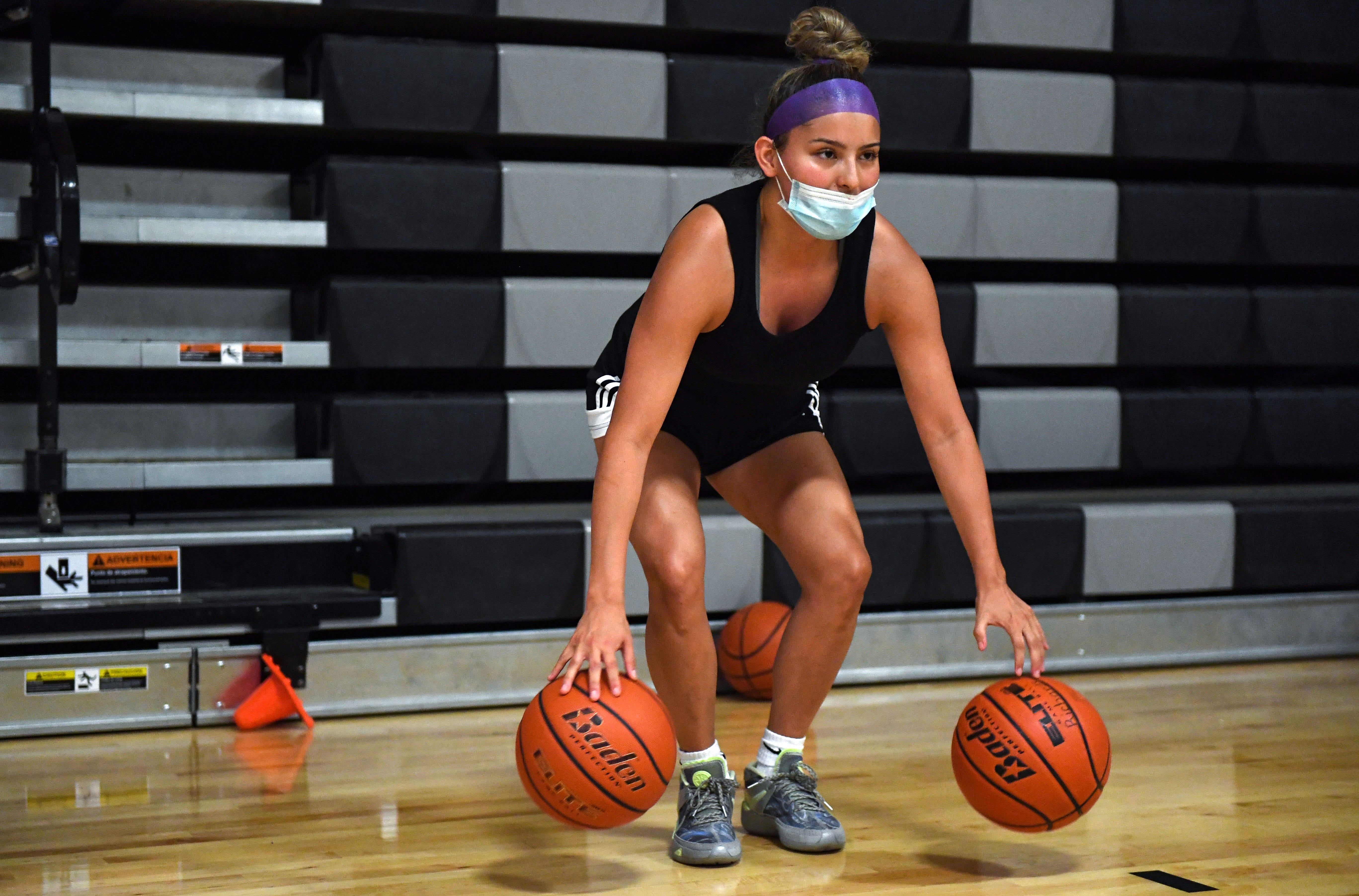 Stevi Fallis practices ball handling during practice on  June 17 on the Pine Ridge Reservation.