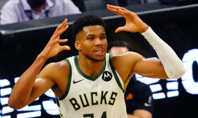 Milwaukee Bucks forward Giannis Antetokounmpo reacts during the Bucks' 118-105 loss to the Phoenix Suns in Game 1 of the NBA Finals on July 6, 2021.