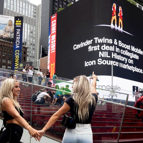 The Cavinder twins celebrate in Times Square as a 